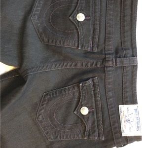 Low, skinny black True Religious jeans